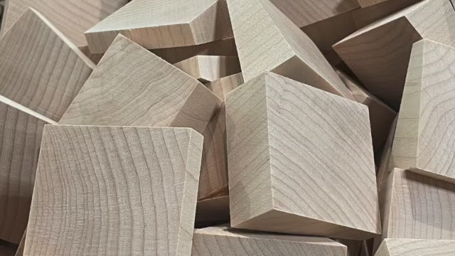 Load video: Custom Turned Wood Designs&#39; wall art in a wave pattern being laid out